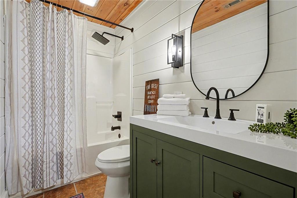 Undisclosed Address Morganton, GA 30560 - Photo 33 of 45 a bathroom with a sink a toilet and shower