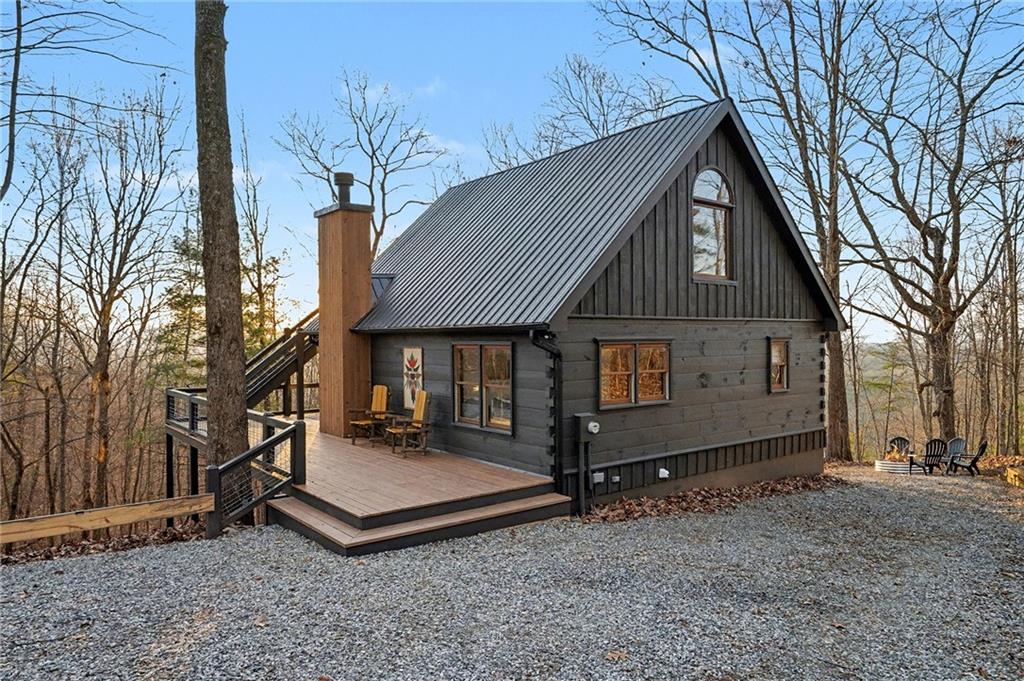 Undisclosed Address Morganton, GA 30560 - Photo 38 of 45 a front view of a house with a yard