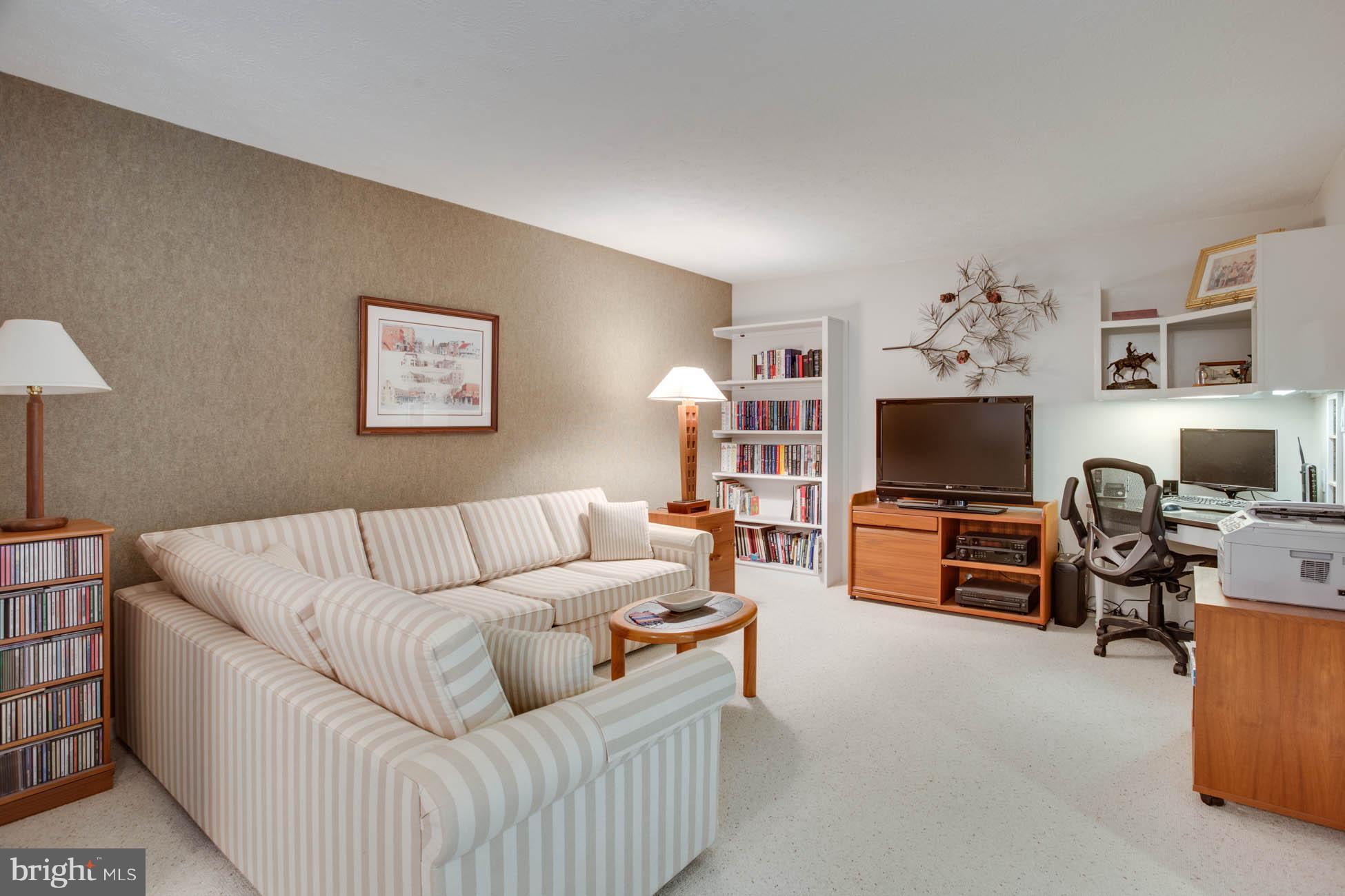 1325 Quail Ridge Drive Reston, VA 20194 - Photo 13 of 27 Family room/study with built ins off kitchen area.