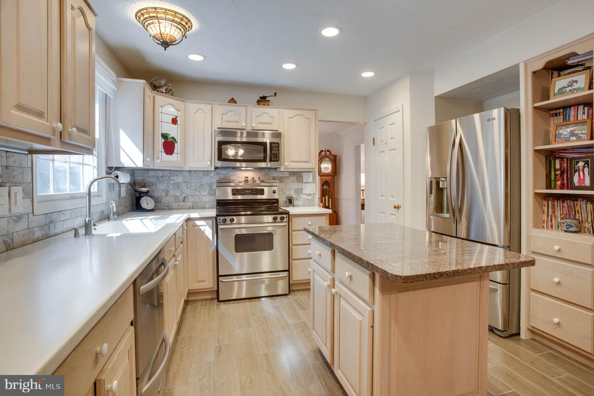 1325 Quail Ridge Drive Reston, VA 20194 - Photo 9 of 27 Updated kitchen with center island and pantry.