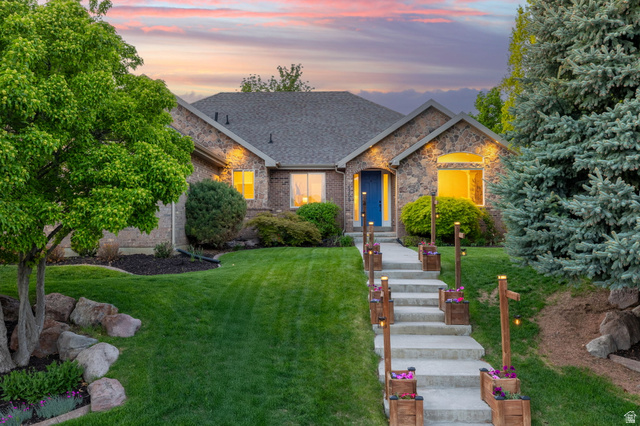 6208 West Bull River Road Highland, UT 84003 - Photo 77 of 90 Stone and brick façade residence featuring a prominent blue entry door