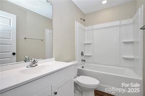 6109 Bunn Simpson Road Marshville, NC 28103 - Photo 13 of 17 a bathroom with a sink a toilet and a bathtub