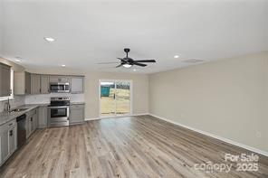 6109 Bunn Simpson Road Marshville, NC 28103 - Photo 2 of 17 a view of kitchen with sink microwave and stove