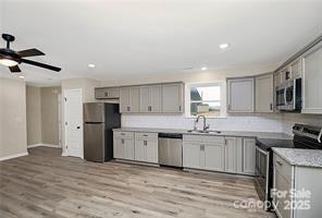 6109 Bunn Simpson Road Marshville, NC 28103 - Photo 5 of 17 a kitchen with refrigerator and cabinets