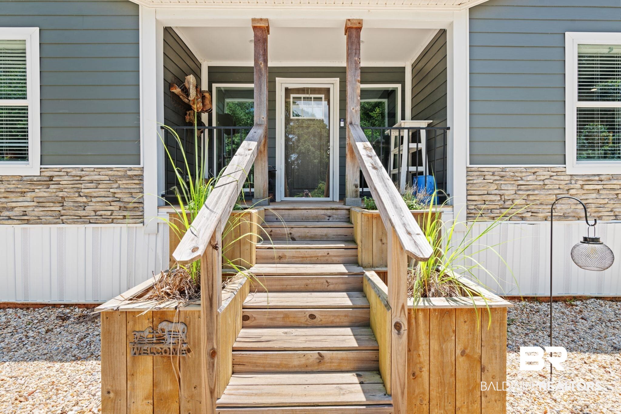 10703 South Ridge Drive Semmes, AL 36575 - Photo 9 of 37 Property entrance with stone siding
