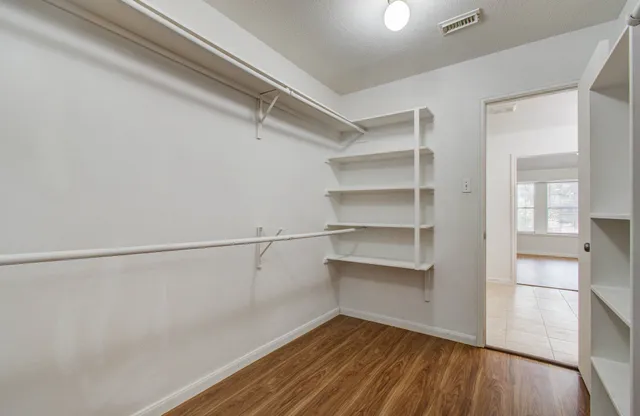 a view of a room with rack on the wall