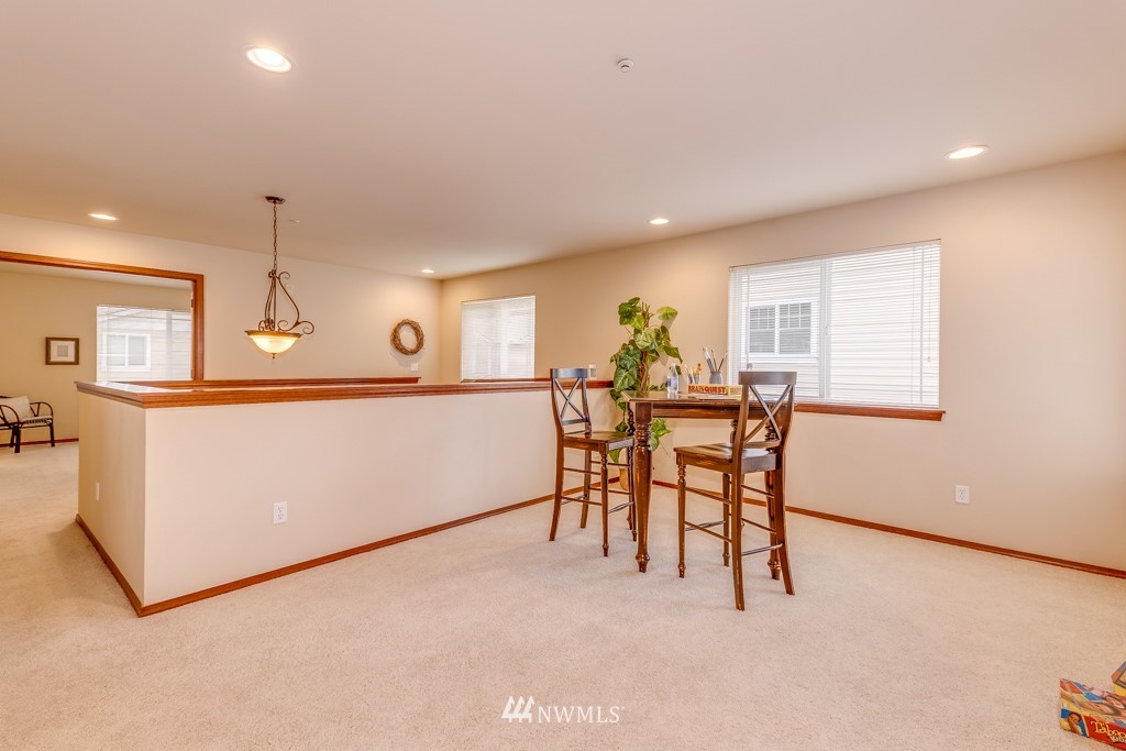 1048 215th Place Southeast Bothell, WA 98021 - Photo 14 of 30 a view of a dining room with furniture and a window