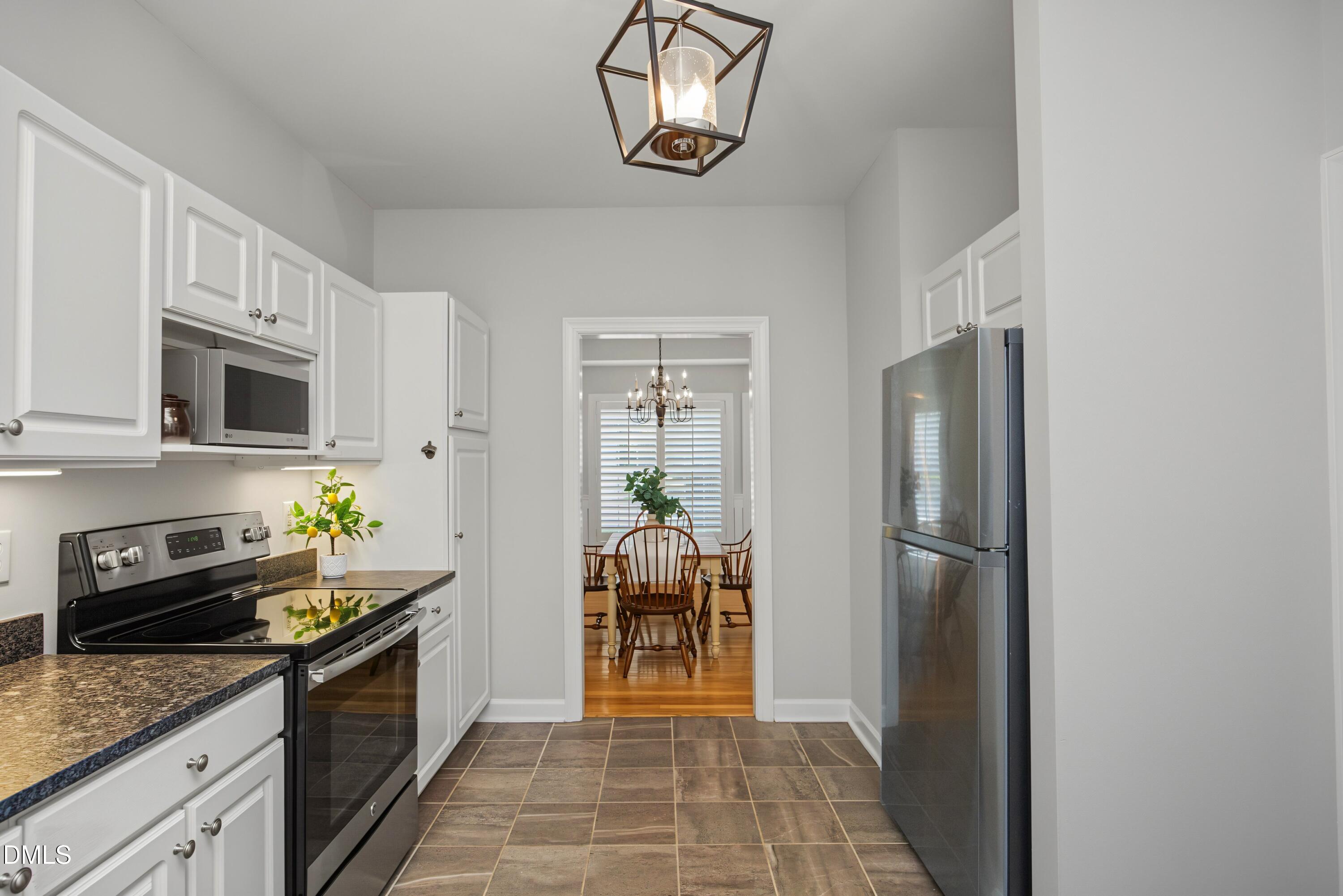 8725 Courage Court Raleigh, NC 27615 - Photo 5 of 41 08Kitchen
