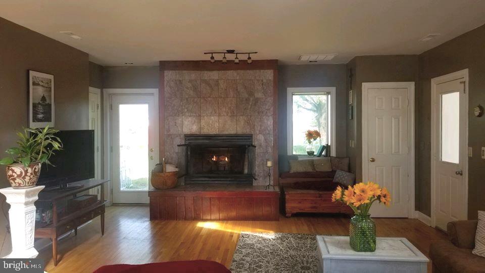 3975 Meadow Bridge Road Salisbury, MD 21804 - Photo 3 of 62 Marble gas fireplace keeps the family room warm