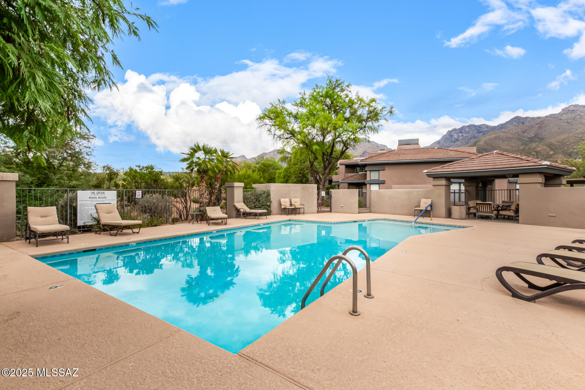 5855 North Kolb Road, Unit 8102 Tucson, AZ 85750 - Photo 23 of 28 a view of a swimming pool with a patio