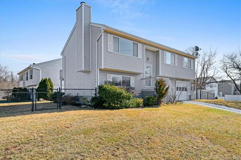5 Roses Farm Road East Haven, CT 06512 - Photo 1 of 1 a front view of a house with a yard