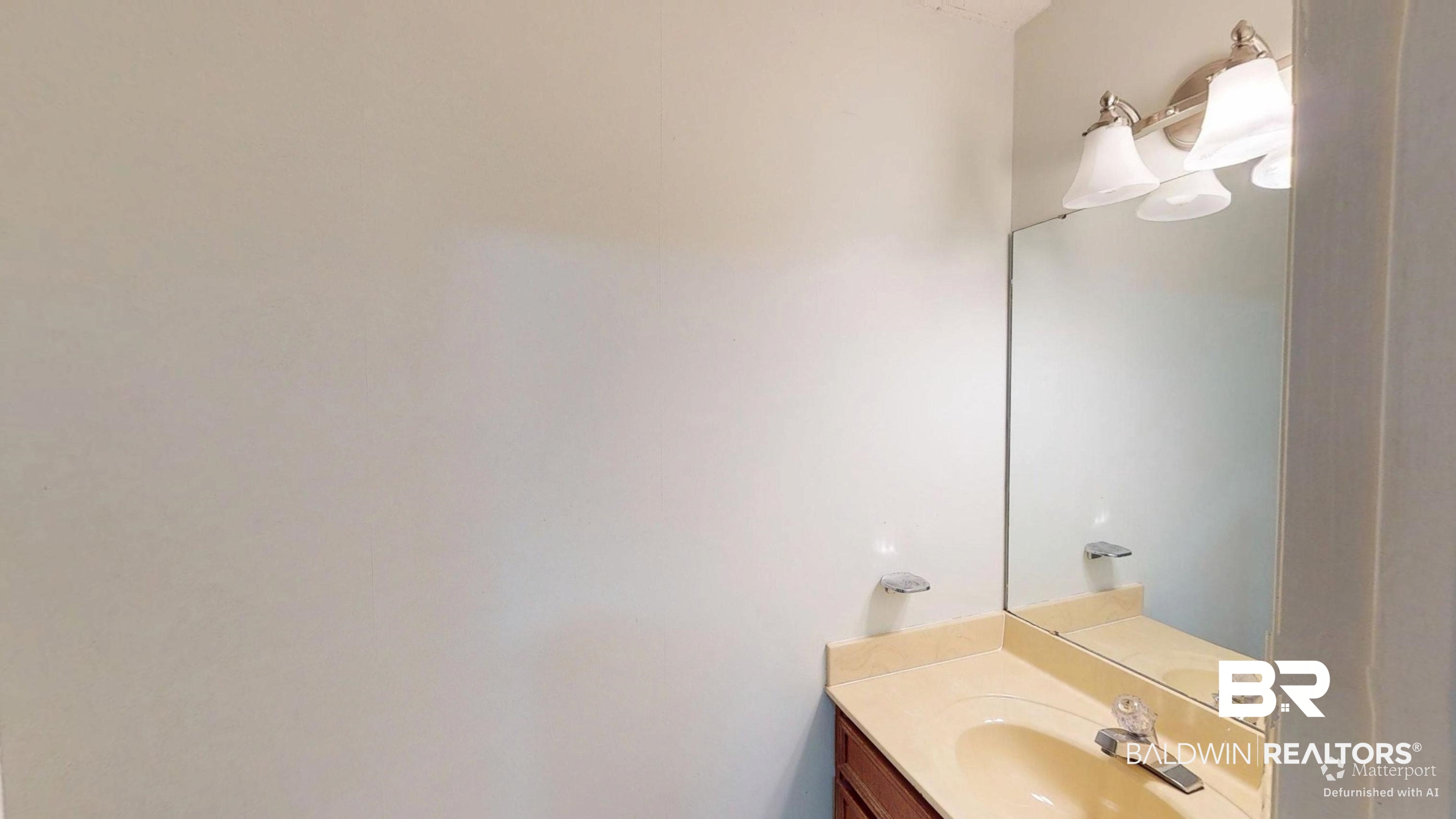 7310 Cheryl Court Mobile, AL 36695 - Photo 22 of 23 Half Bathroom with vanity off the laundry room.