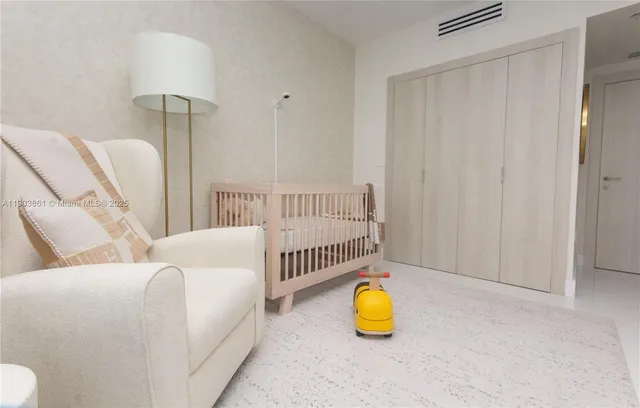 a bed room with a bed and a table