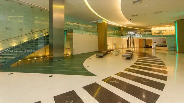 a room with gym equipment and a large window