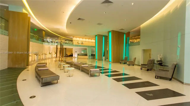 a room with gym equipment and mirrors