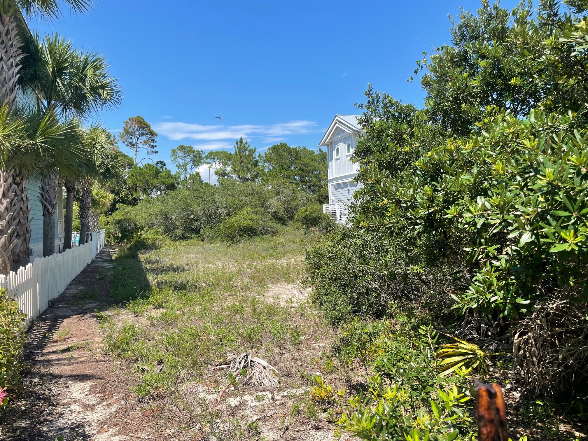 Undisclosed Address Panama City Beach, FL 32413 - Photo 6 of 20 a view of a yard