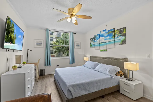 a bedroom with a bed and a table