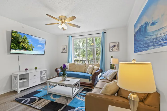 a living room with furniture and a window