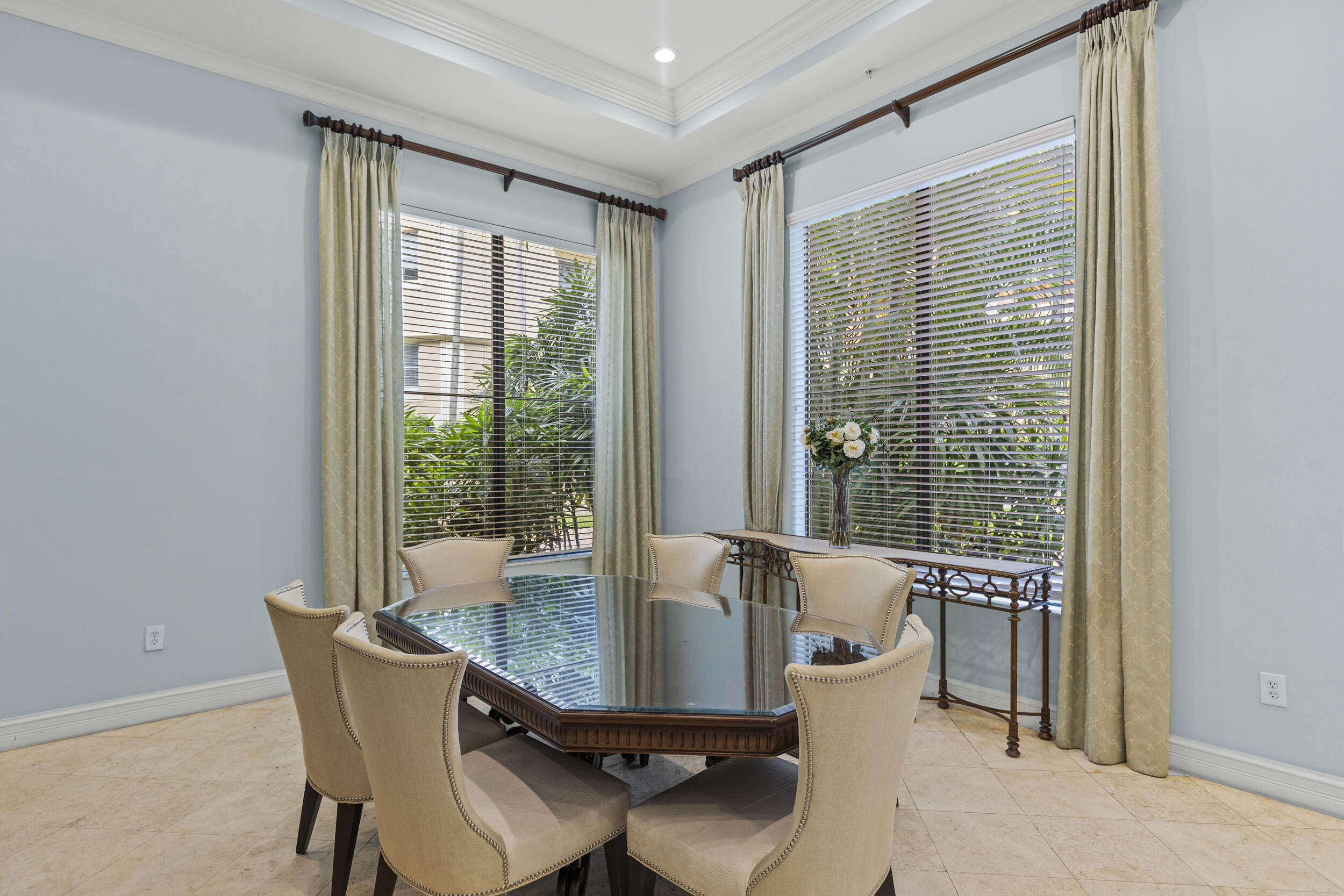 630 South Sapodilla Avenue, Unit 202 West Palm Beach, FL 33401 - Photo 21 of 31 a dining room with furniture and window