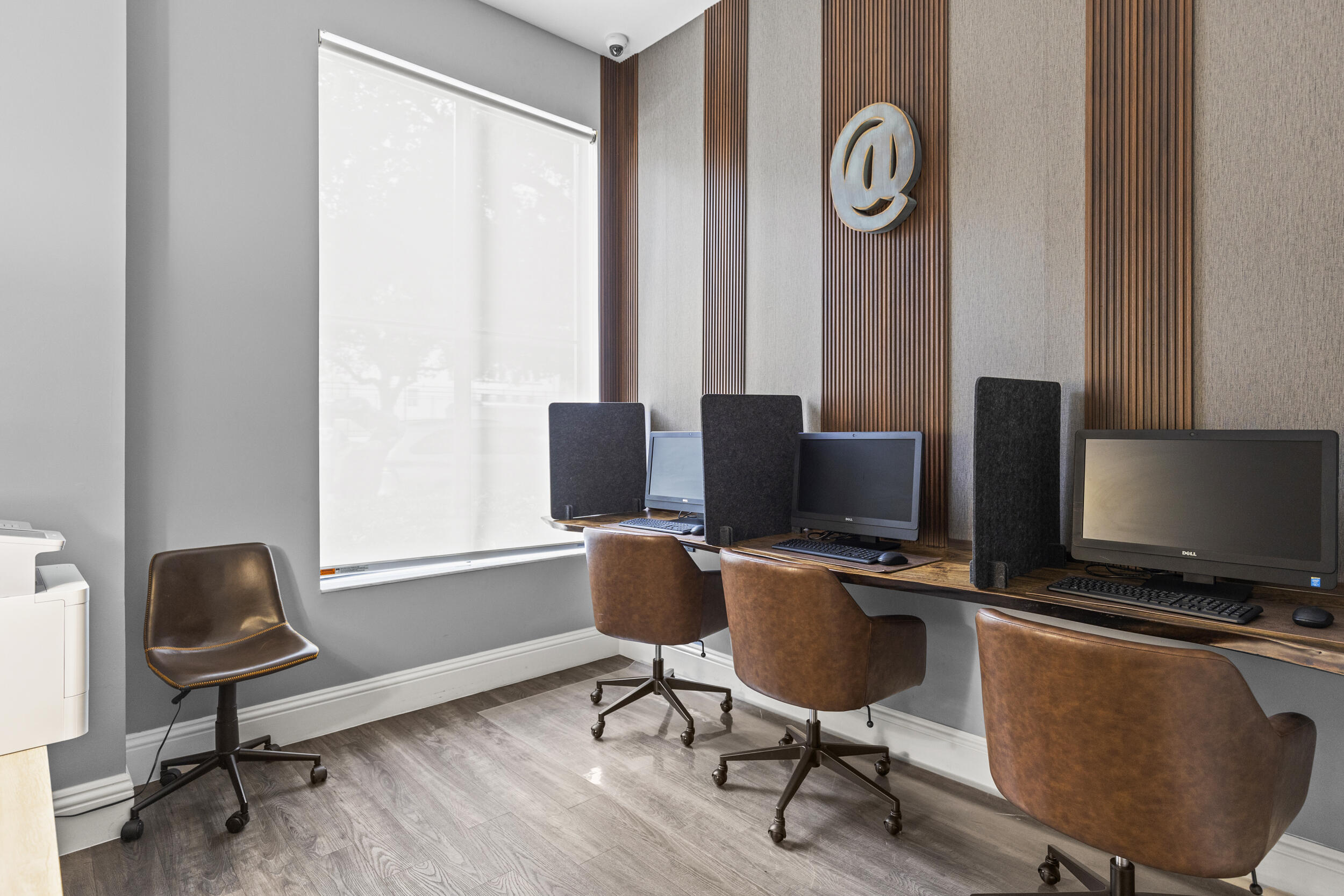 630 South Sapodilla Avenue, Unit 202 West Palm Beach, FL 33401 - Photo 25 of 31 a view of a workspace with furniture and a window