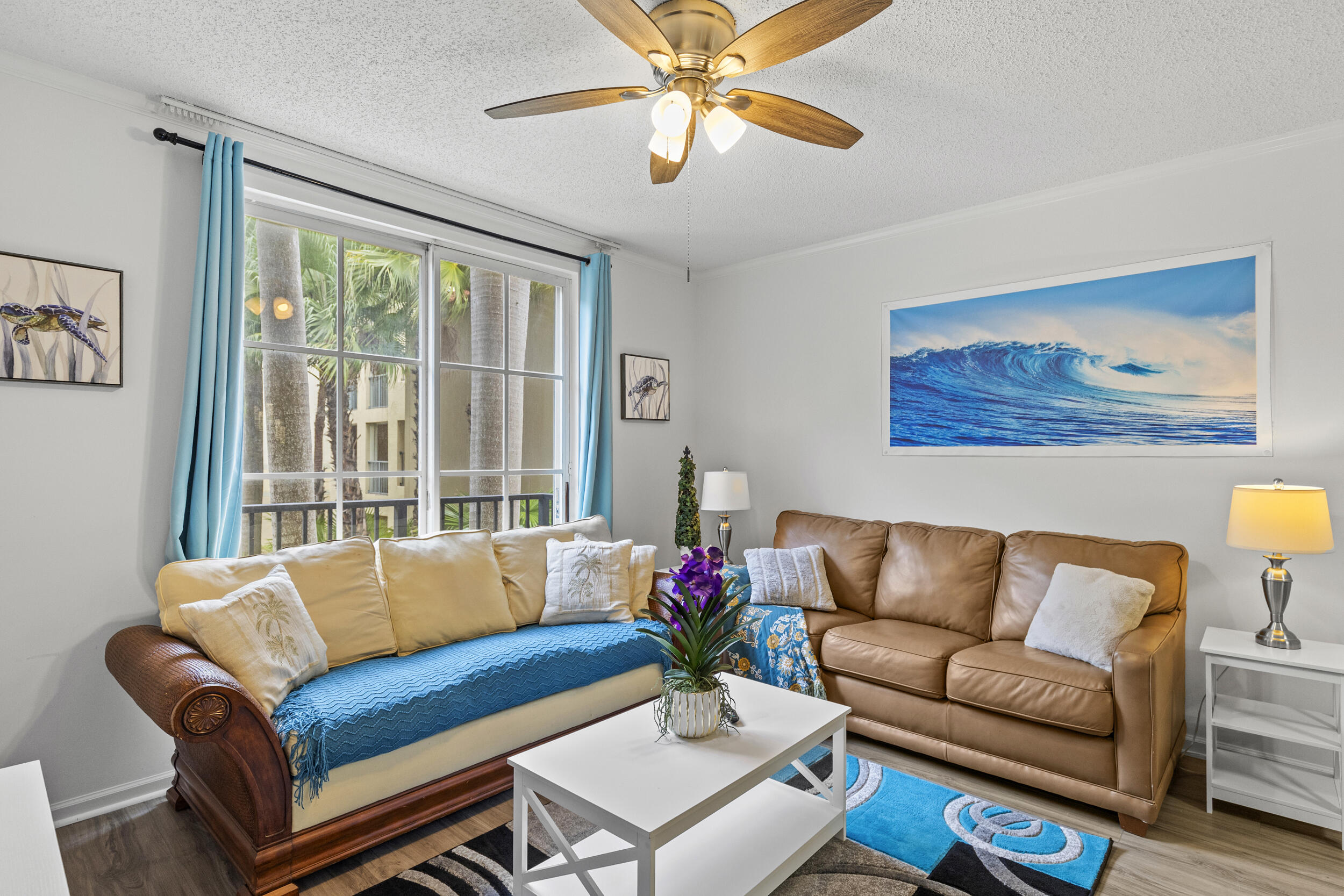 630 South Sapodilla Avenue, Unit 202 West Palm Beach, FL 33401 - Photo 4 of 31 a living room with furniture and a large window