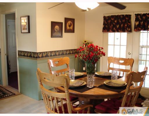 337 Manalapan Road Spotswood, NJ 08884 - Photo 3 of 10 a dining room with furniture and window