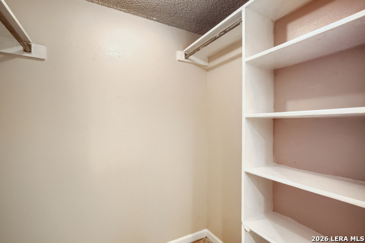 8655 Datapoint, Unit 403 San Antonio, TX 78229 - Photo 15 of 22 a view of an empty walk in closet