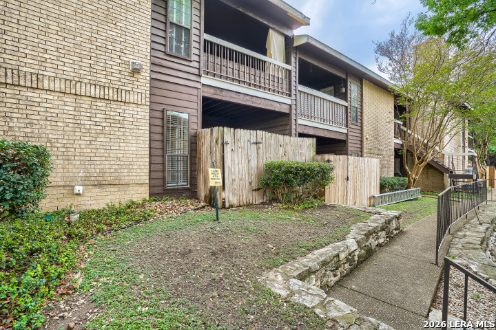 8655 Datapoint, Unit 403 San Antonio, TX 78229 - Photo 21 of 22 a view of a house with a yard