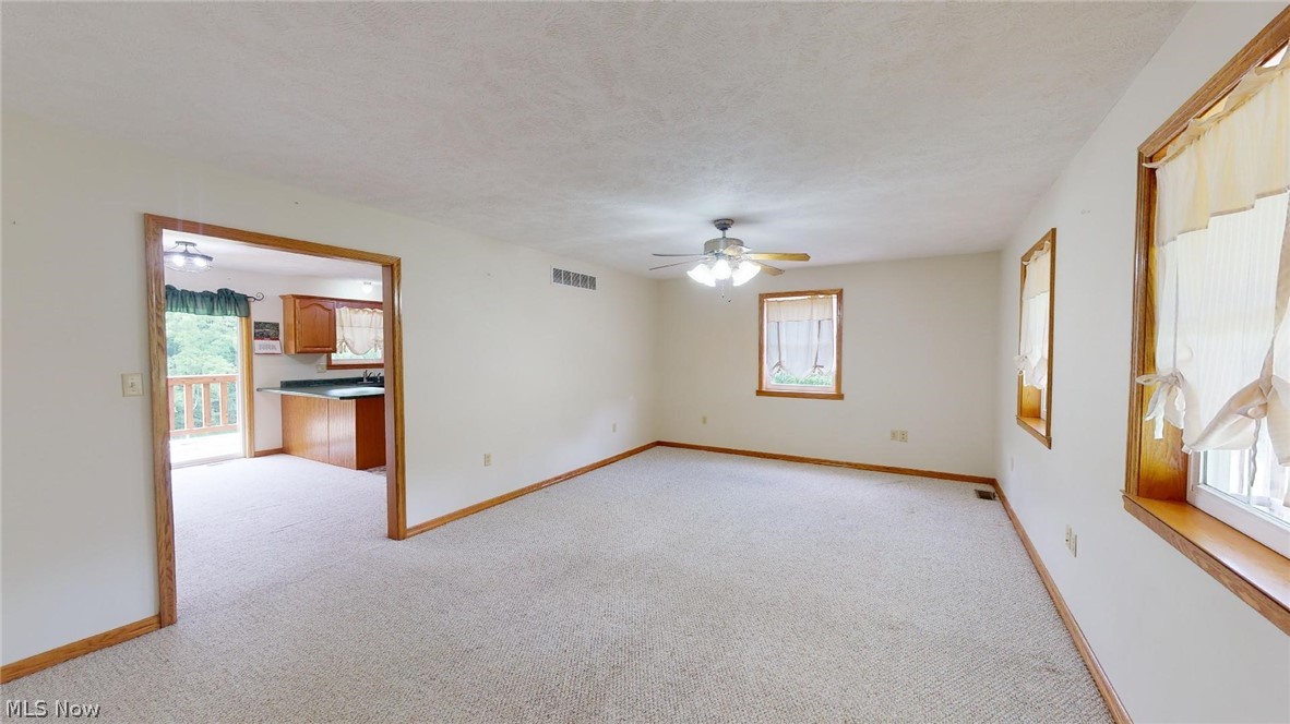 469 Pine Run Road Washington, WV 26181 - Photo 9 of 24 Living Room looking into kitchen