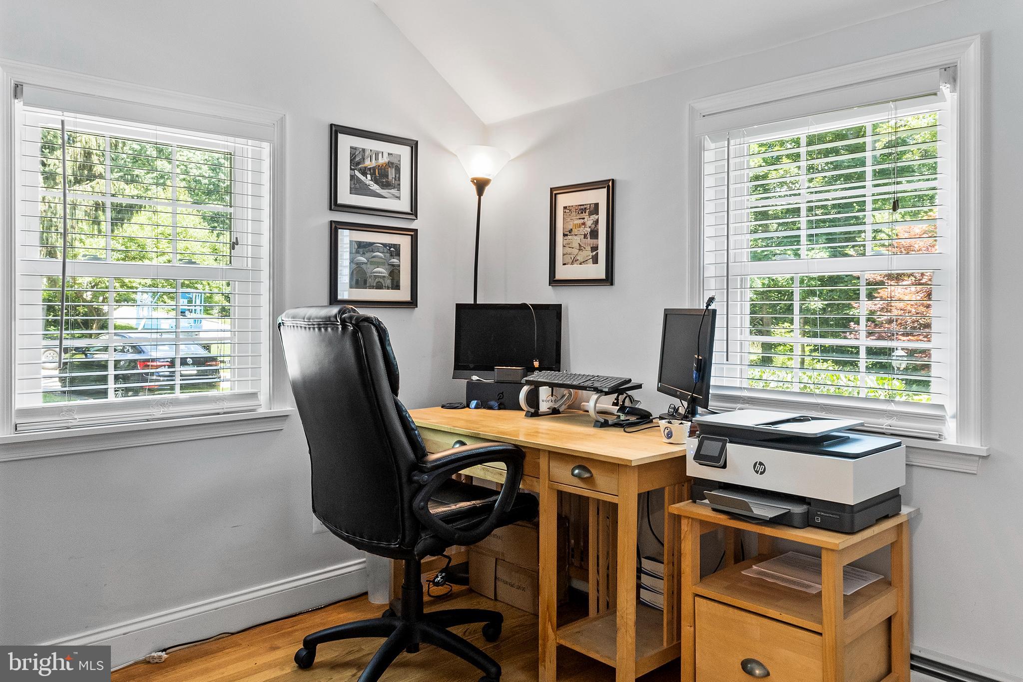 106 Vincent Road Paoli, PA 19301 - Photo 14 of 29 a view of a workspace with furniture and a window
