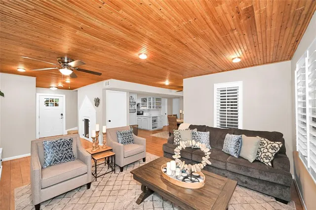 a living room with furniture and a table