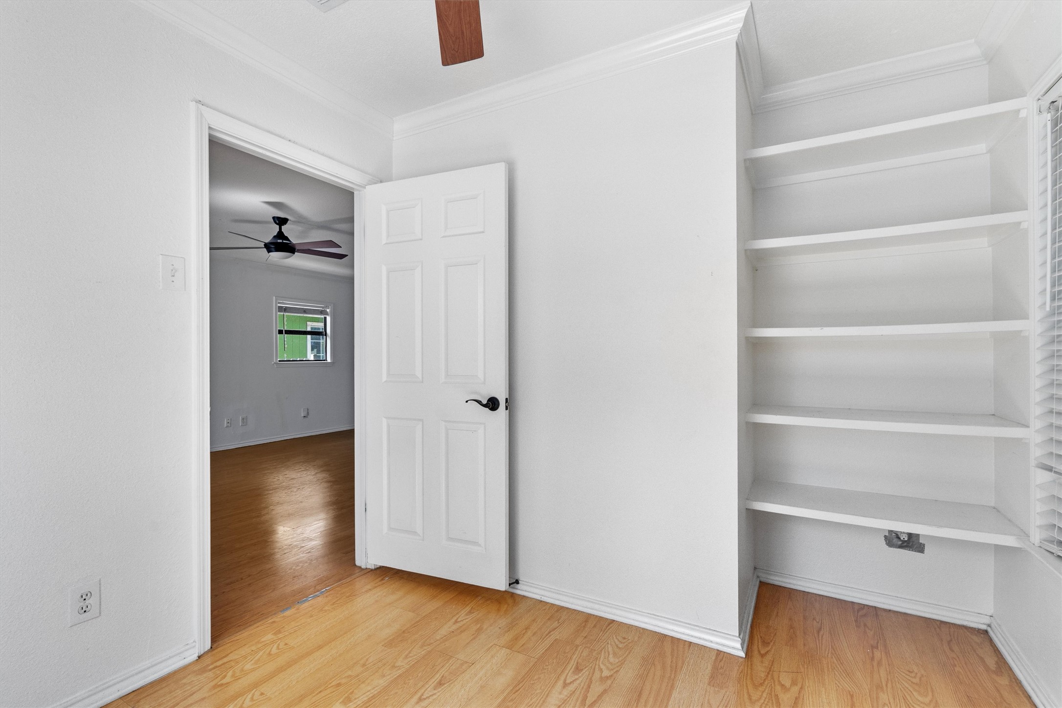 2710 East 3rd Street Austin, TX 78702 - Photo 20 of 28 a view of an empty room with wooden floor and closet