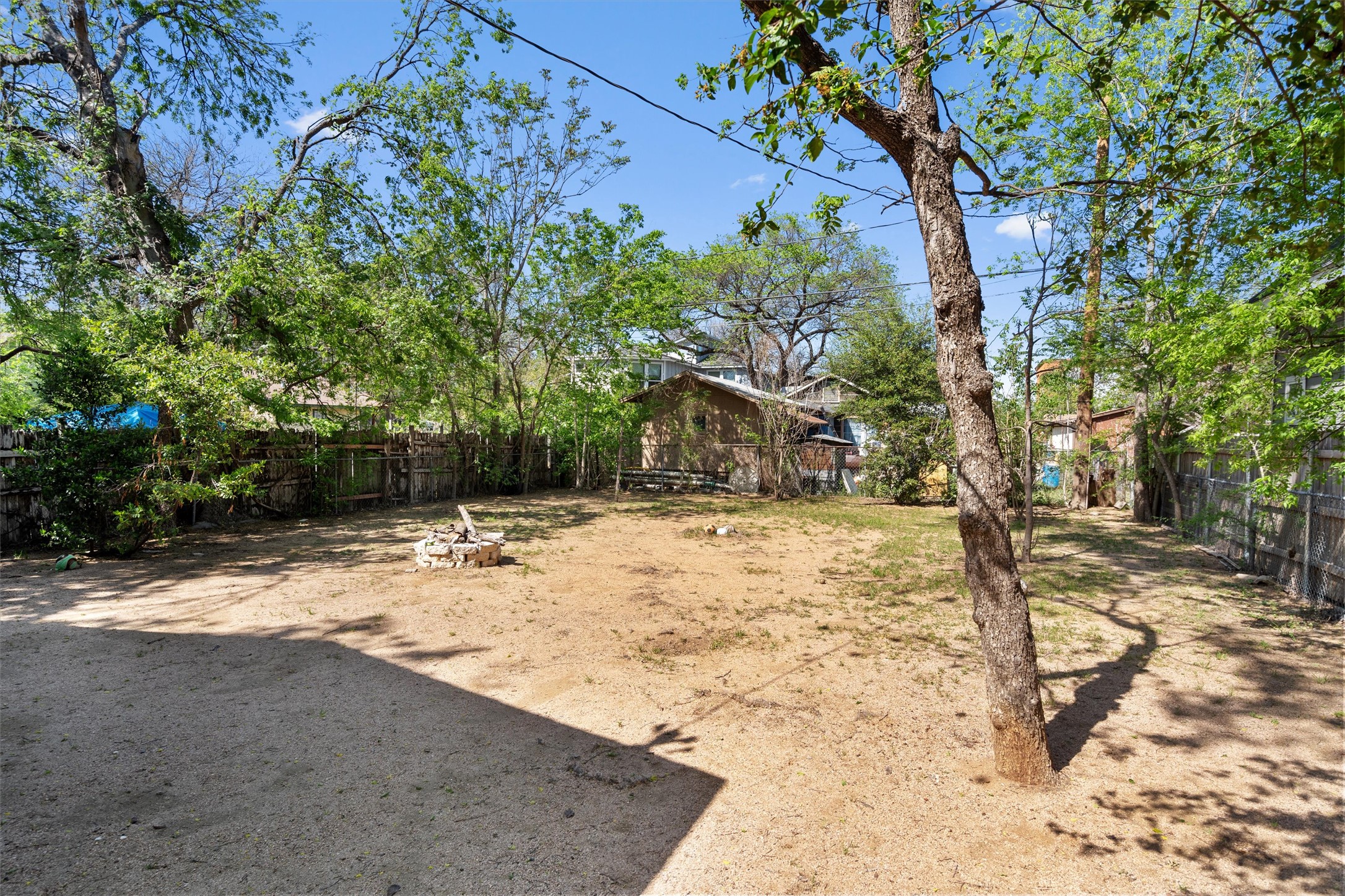 2710 East 3rd Street Austin, TX 78702 - Photo 25 of 28 a view of a yard with plants and trees