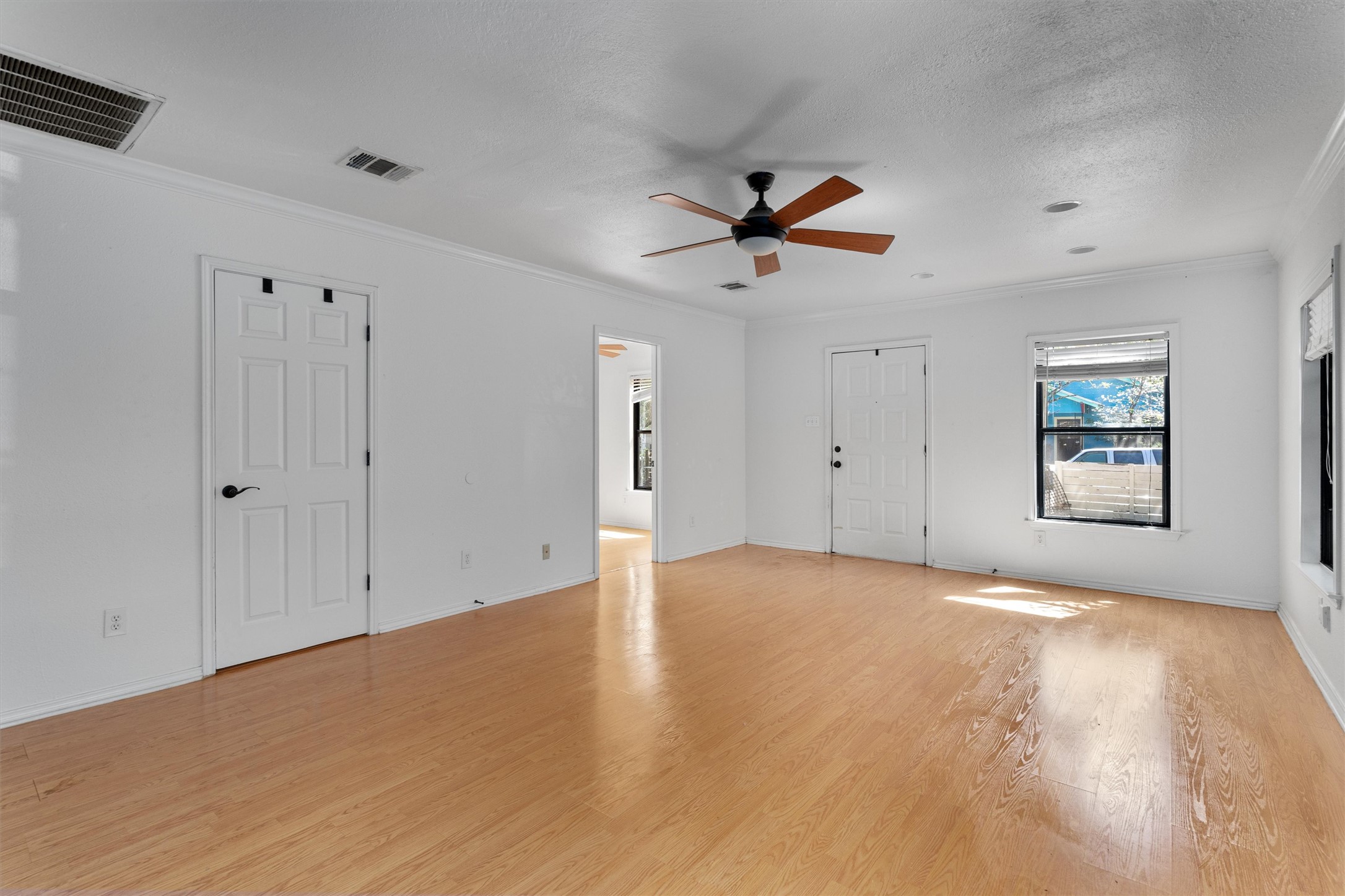 2710 East 3rd Street Austin, TX 78702 - Photo 10 of 28 a view of an empty room with a window
