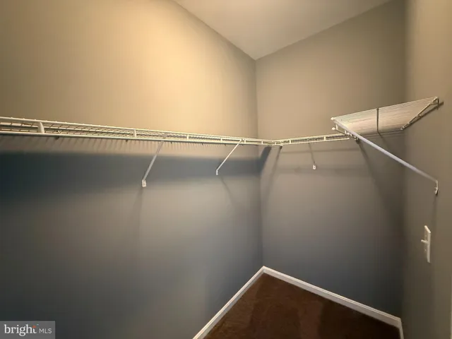 a view of small space with racks on the wall