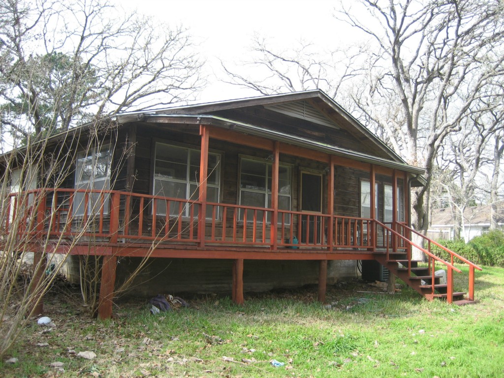 169 Pine Song Bastrop, TX 78602 - Photo 1 of 1 a backyard of a house with wooden deck and barbeque oven