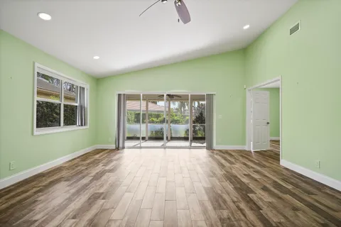 a bedroom with bed and a window