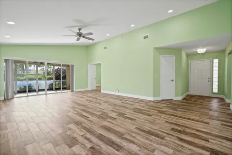 a view of an empty room with a window