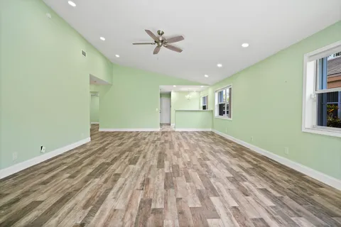 a view of a porch and a floor to ceiling window