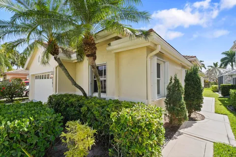 a view of an empty room with windows