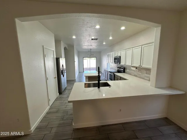 a view of a living room with a sink
