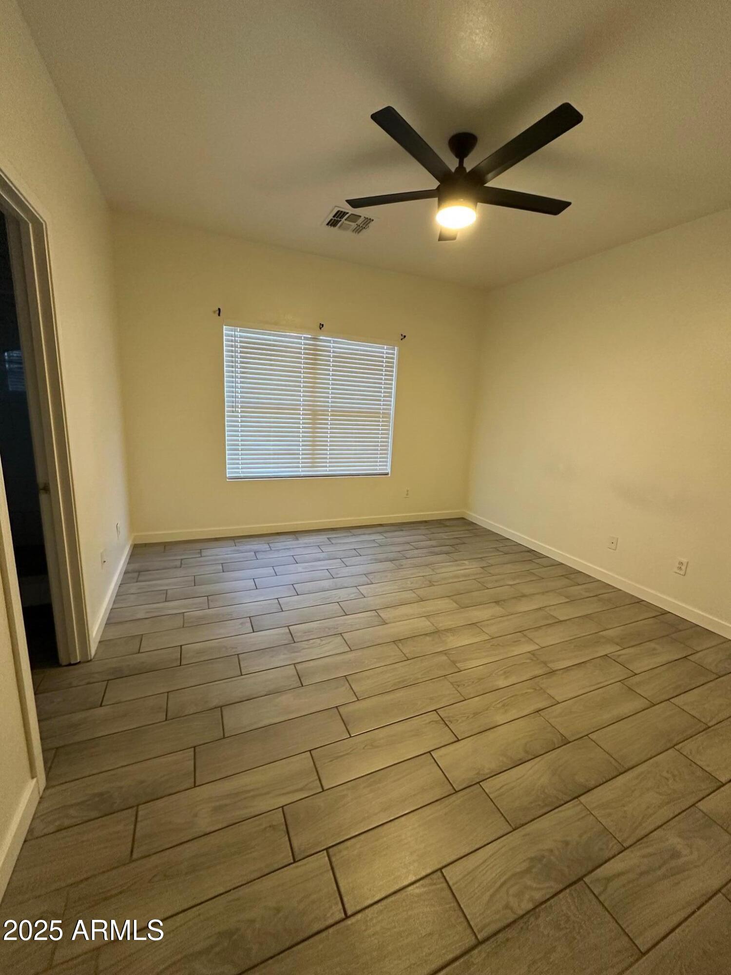 2767 South Sailors Way Gilbert, AZ 85295 - Photo 9 of 15 a view of an empty room