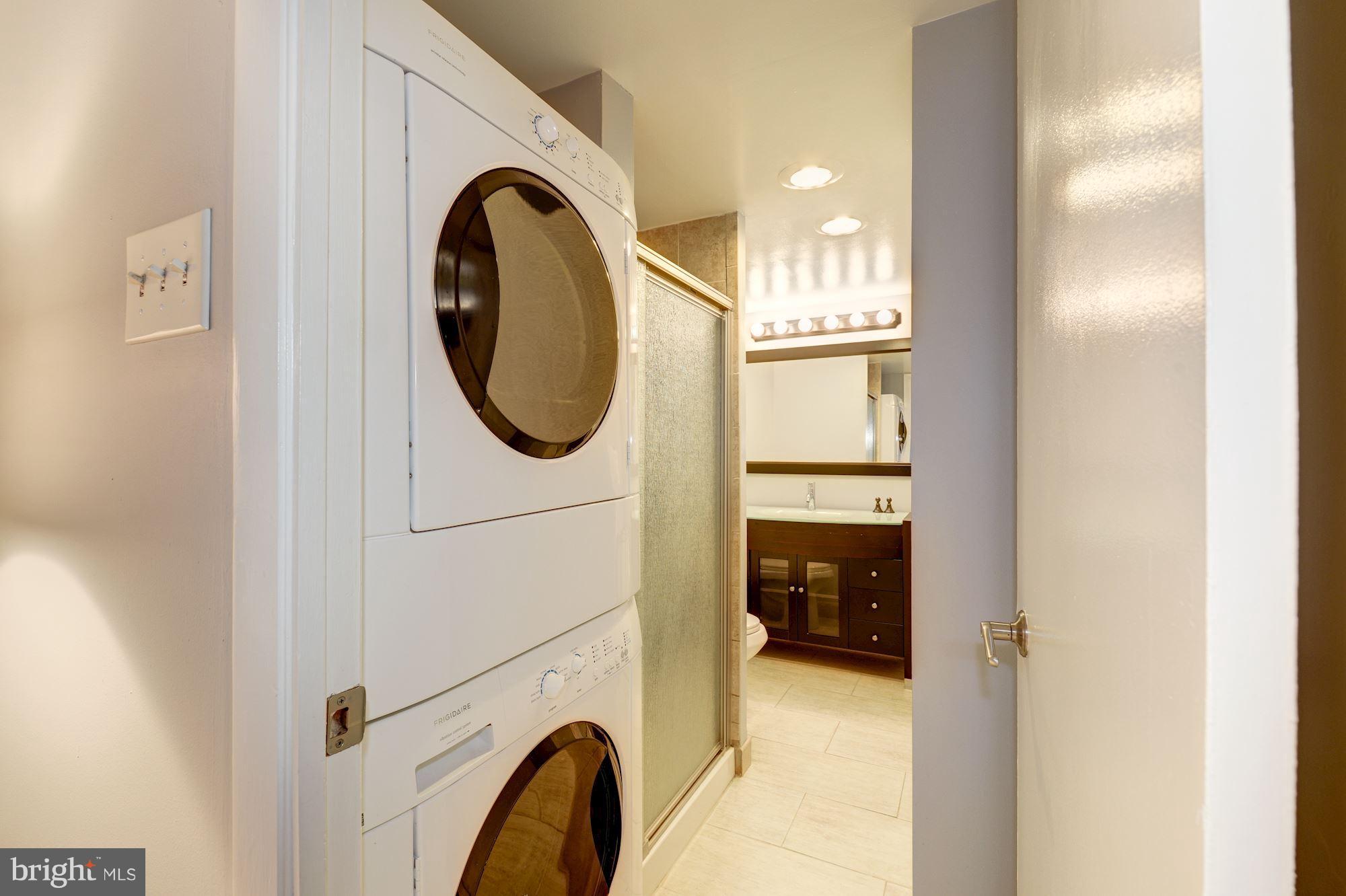 1245 13th Street Northwest, Unit 101 Washington, DC 20005 - Photo 15 of 16 a bathroom with a sink and a washer