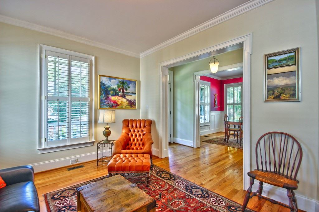 516 Pace Street Raleigh, NC 27604 - Photo 6 of 25 Custom Plantation Shutters in both the Living and Dining Rooms. Living Room