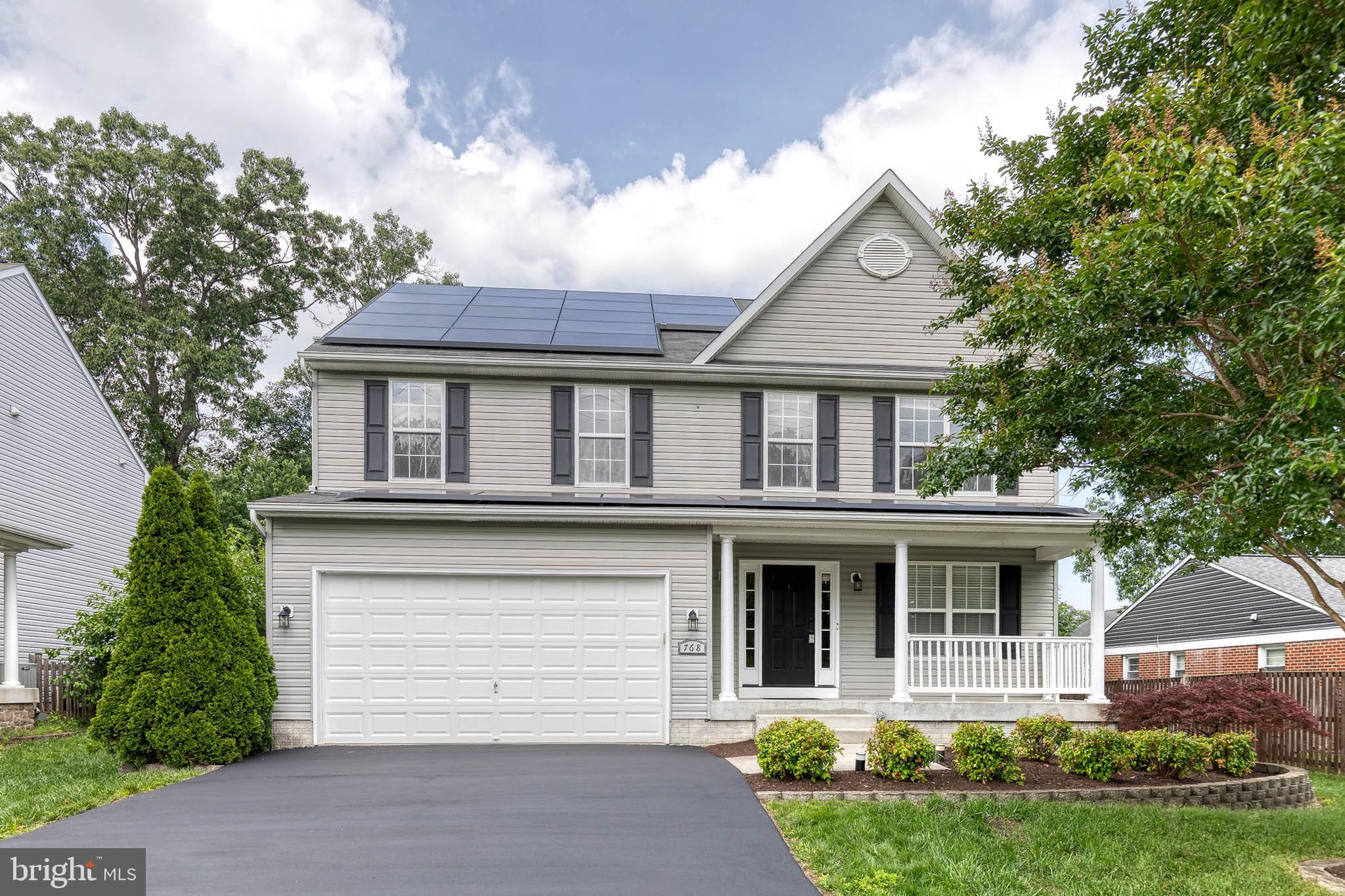 768 Stevenson Road Severn, MD 21144 - Photo 1 of 41 a front view of a house with garden