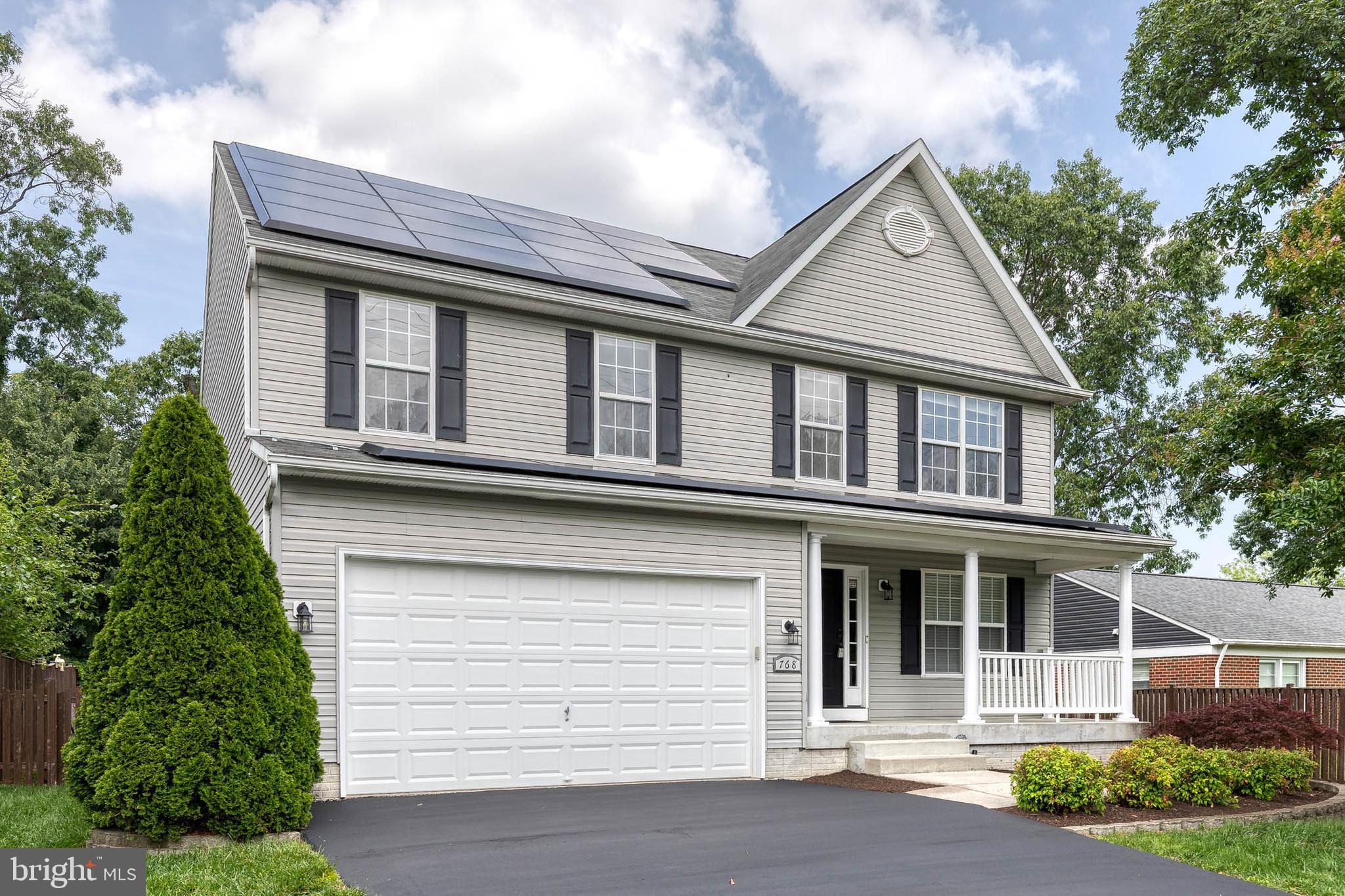 768 Stevenson Road Severn, MD 21144 - Photo 2 of 41 a front view of a house with a yard