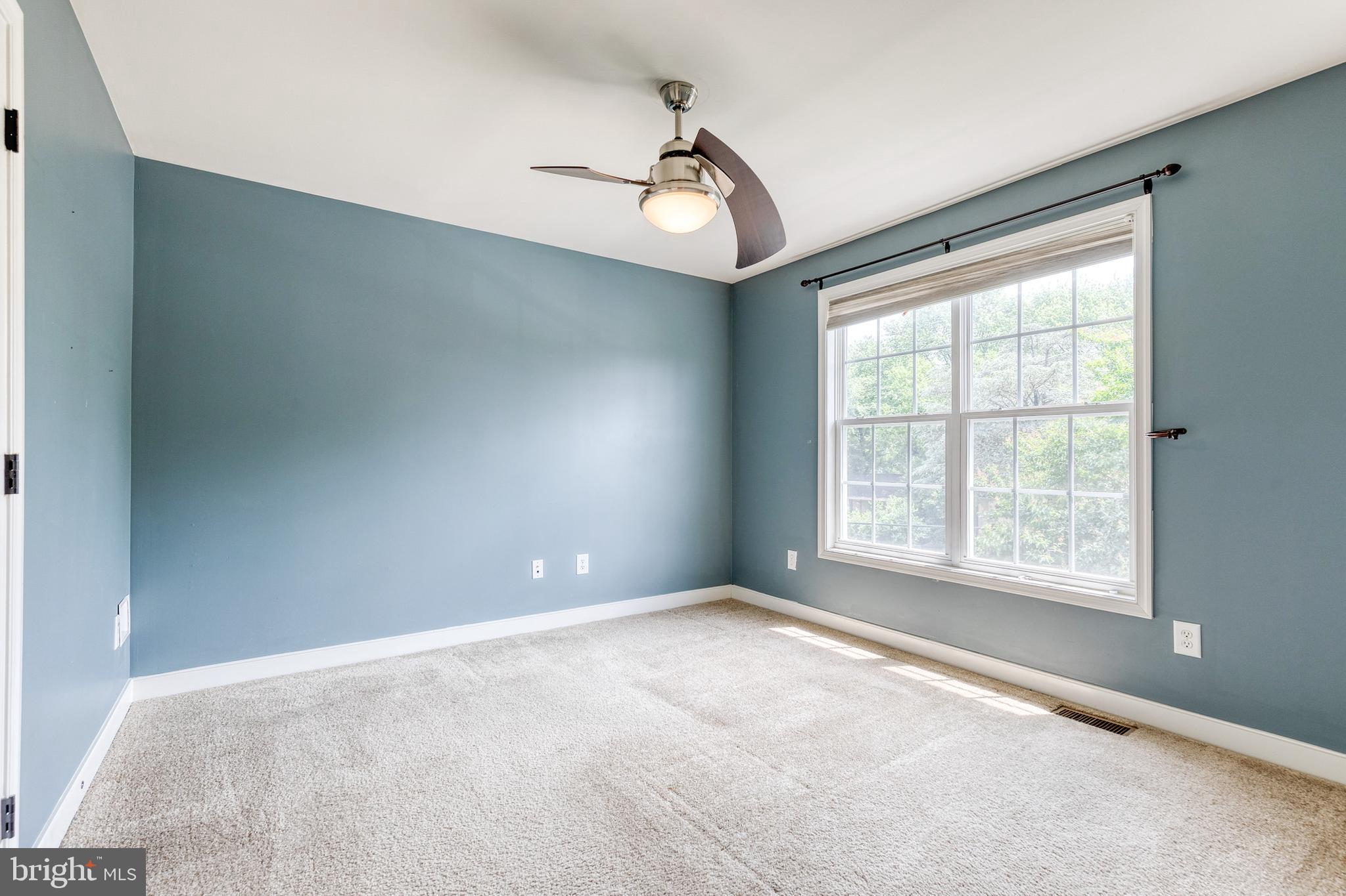 768 Stevenson Road Severn, MD 21144 - Photo 30 of 41 an empty room with a window