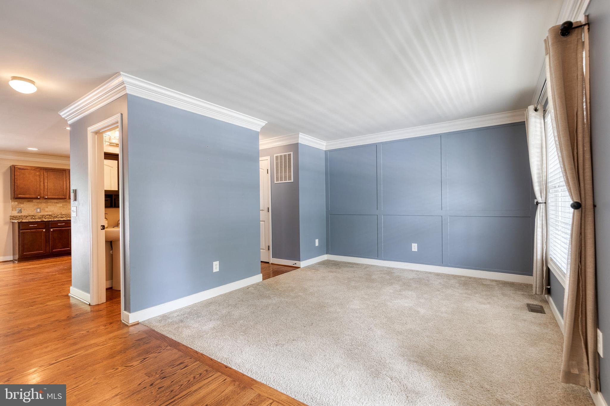768 Stevenson Road Severn, MD 21144 - Photo 3 of 41 a view of a big room with wooden floor