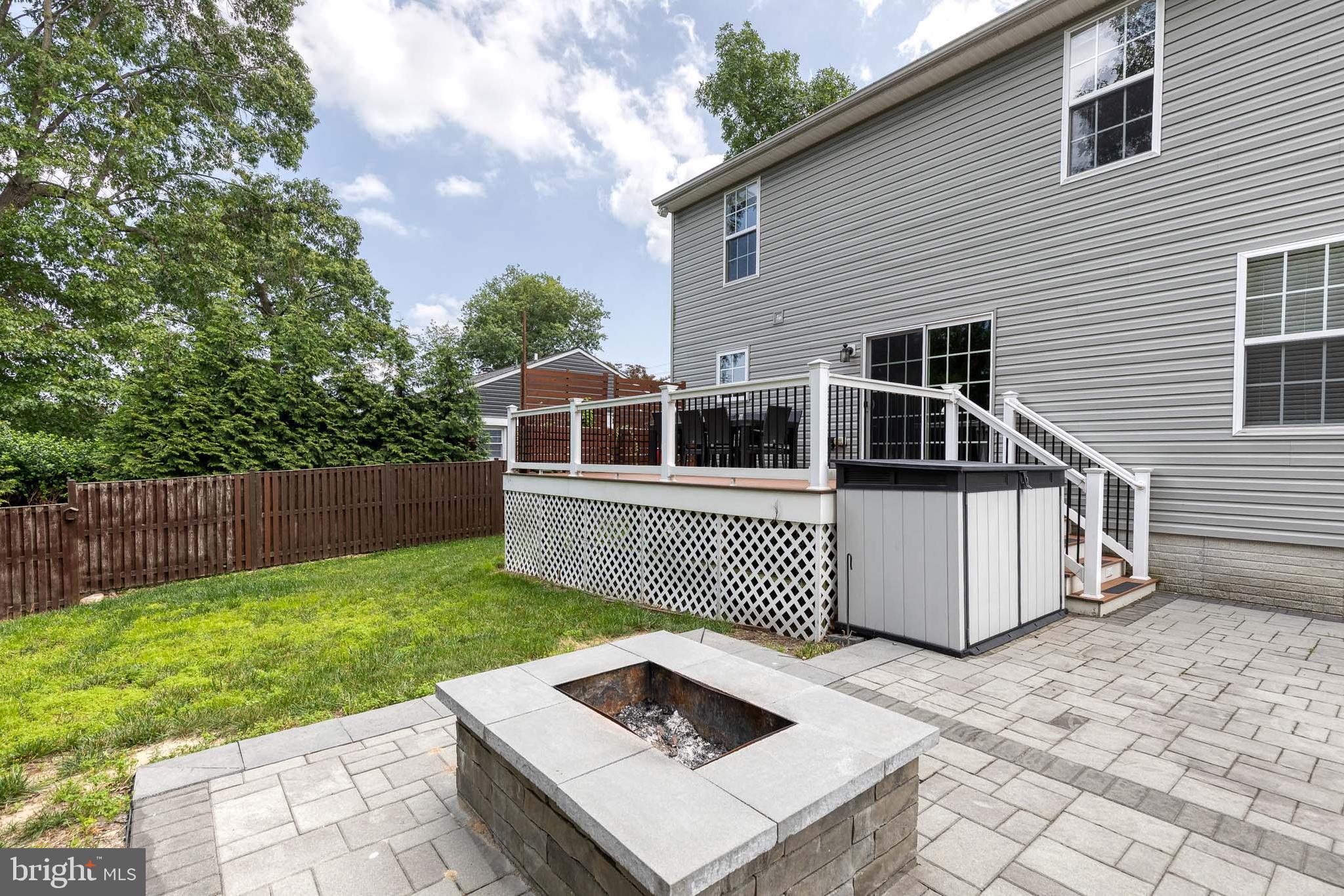 768 Stevenson Road Severn, MD 21144 - Photo 41 of 41 a view of a house with backyard and wooden fence