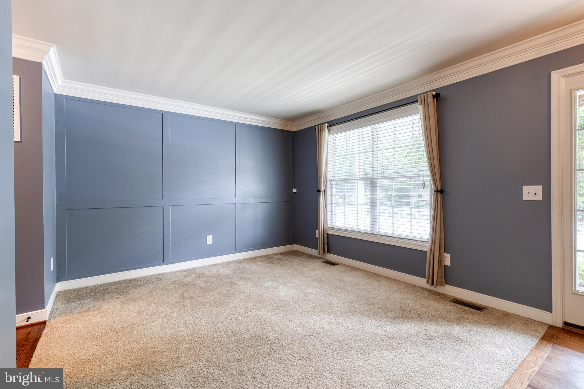 768 Stevenson Road Severn, MD 21144 - Photo 5 of 41 a view of an empty room with a window